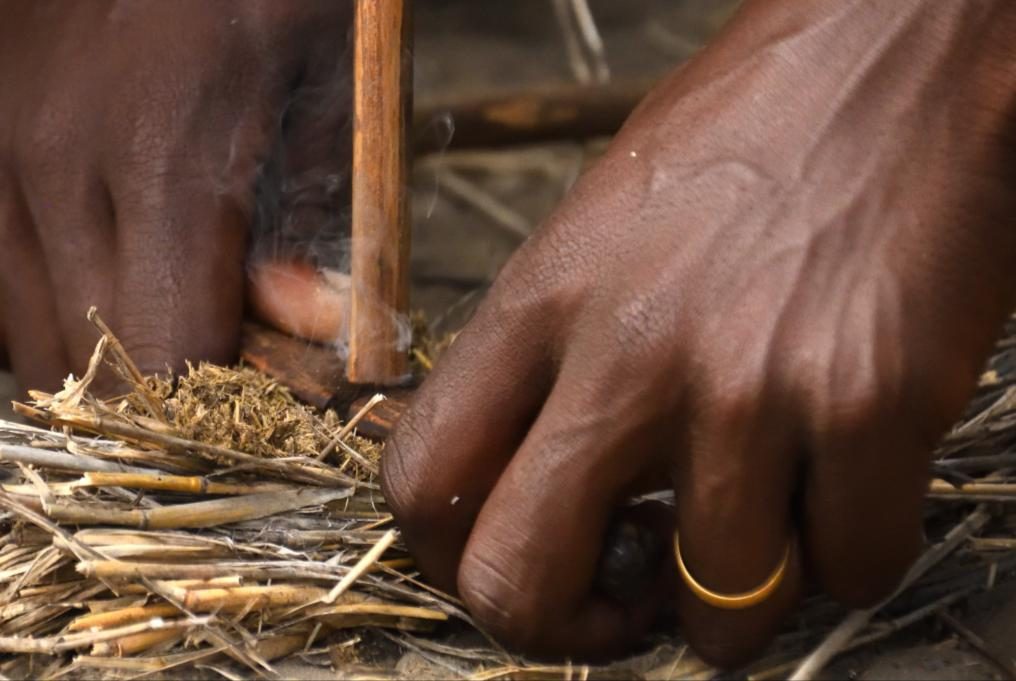 Hands working carefully with natural fibre